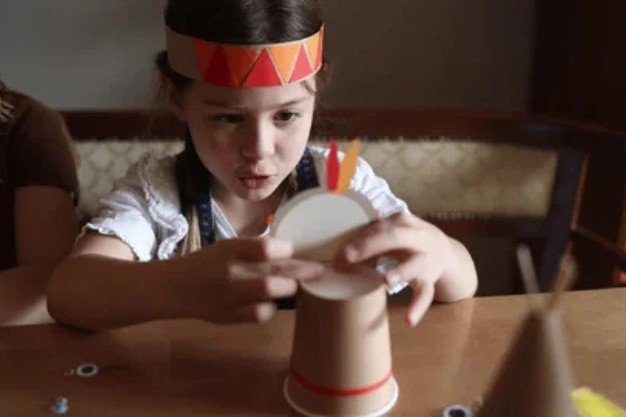 Children doing creative DIY art and craft activities during summer break